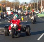 Salford Santa Scooter Run  to The Christie